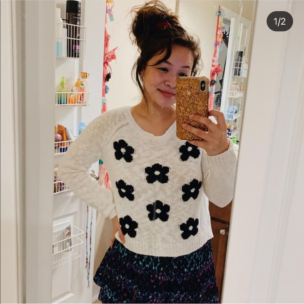 White and black floral sweater